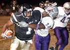 gaffney fb-05 sportsaction  Gaffney WR Sidney Rice (1) drives through West Ashley defender Marcus Haynes (24) toward the endzone during the first half of football action at Gaffney High School Friday night, 11-14-03.